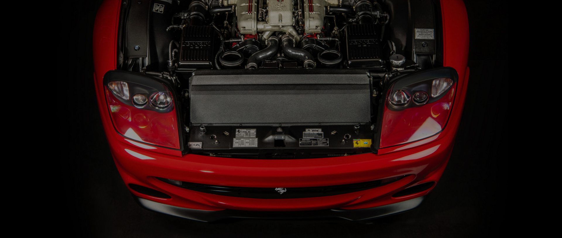 Imponent engine of Ferrari {insert model} Majestic Presence of 255 horse power
